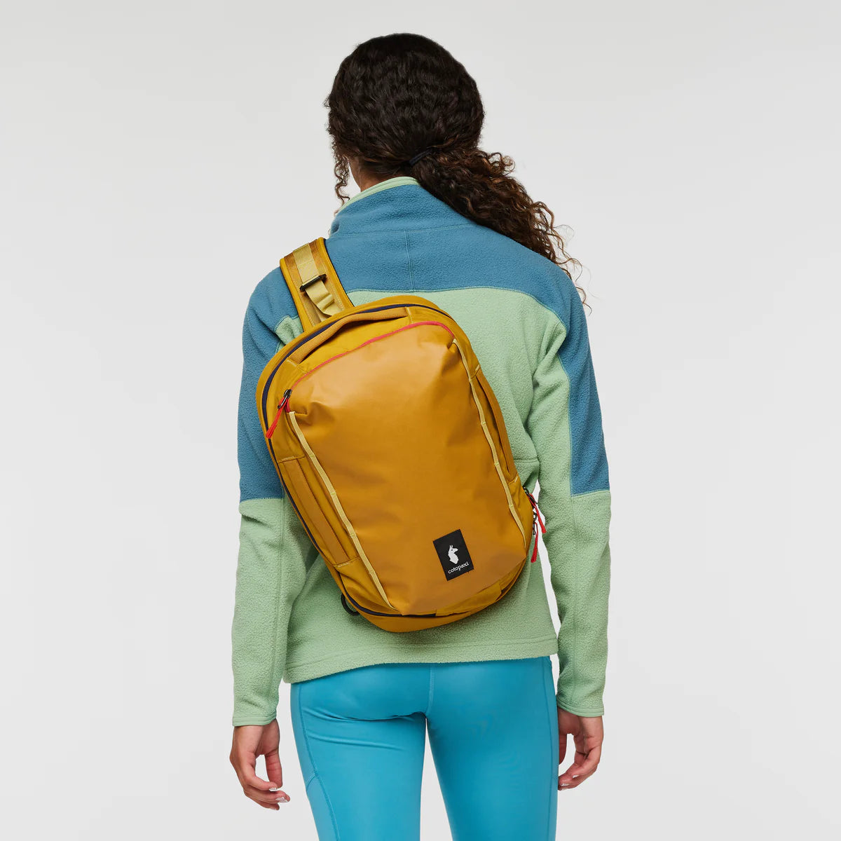 Cotopaxi Chasqui 13L Sling Cada Día - Amber