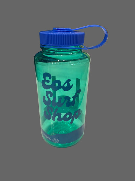 Green water bottle with blue cap and 'Eps Surf Shop' text on a white surface.