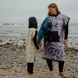 Nomadix Changing Poncho: Lazy Daisy Dusk S/M